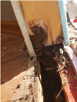 Rotting around door from poor deck installation